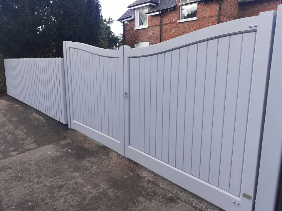 Bespoke painted driveway gates made by PJ Gates & Automation