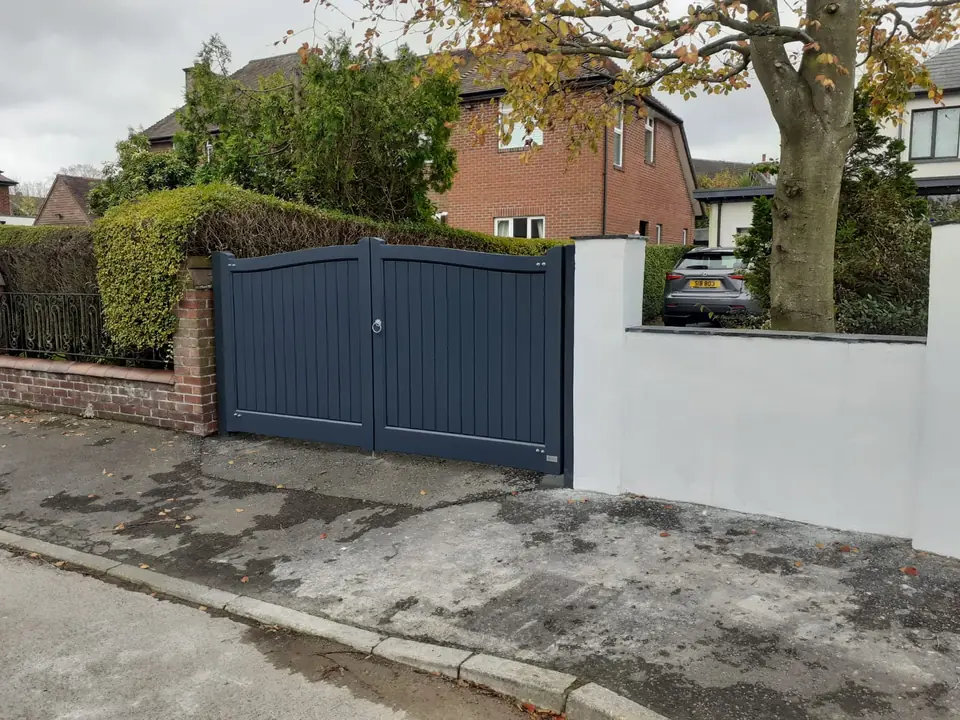 Bespoke painted driveway gates made by PJ Gates & Automation