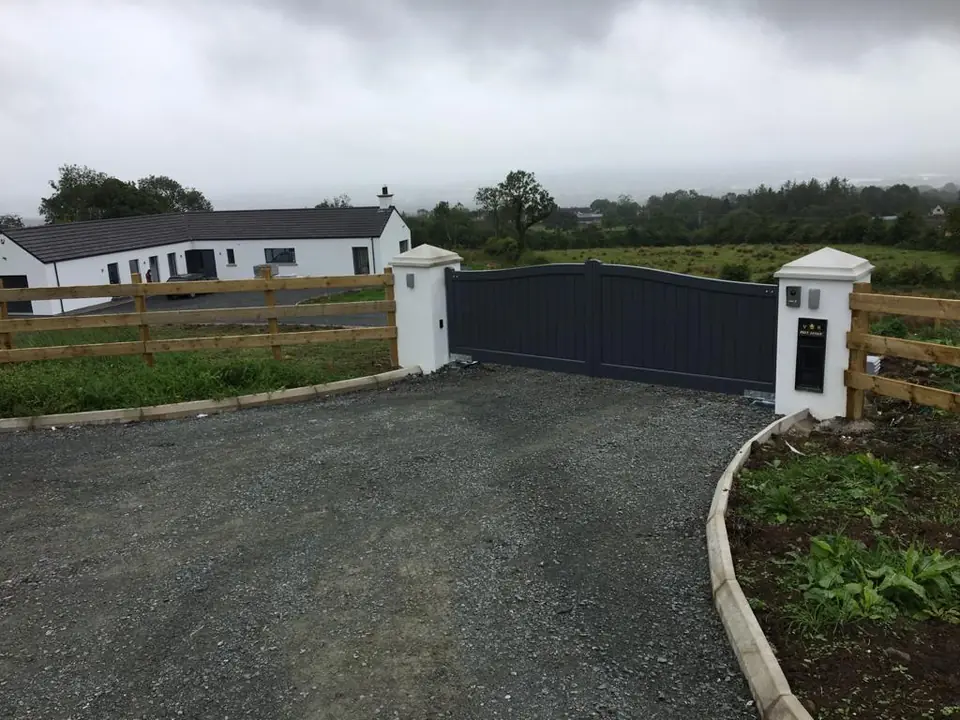 Bespoke painted driveway gates made by PJ Gates & Automation