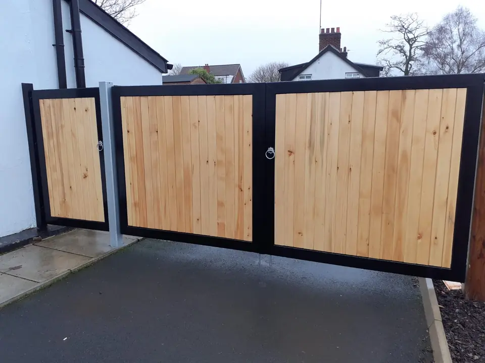 Bespoke painted driveway gates made by PJ Gates & Automation