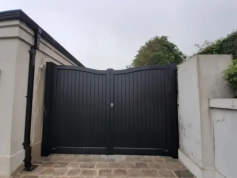 Bespoke painted driveway gates made by PJ Gates & Automation
