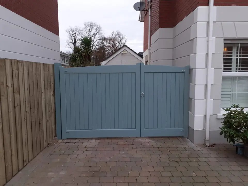 Bespoke painted driveway gates made by PJ Gates & Automation