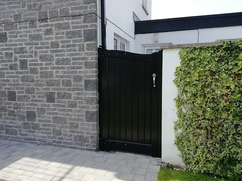 Bespoke painted driveway gates made by PJ Gates & Automation