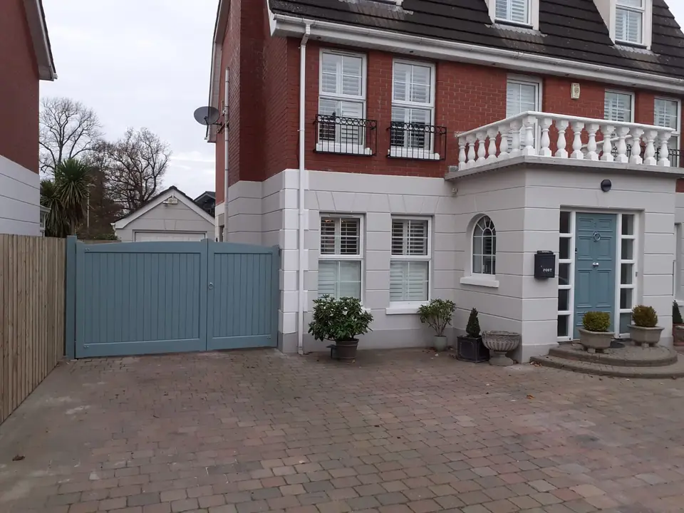 Bespoke painted driveway gates made by PJ Gates & Automation