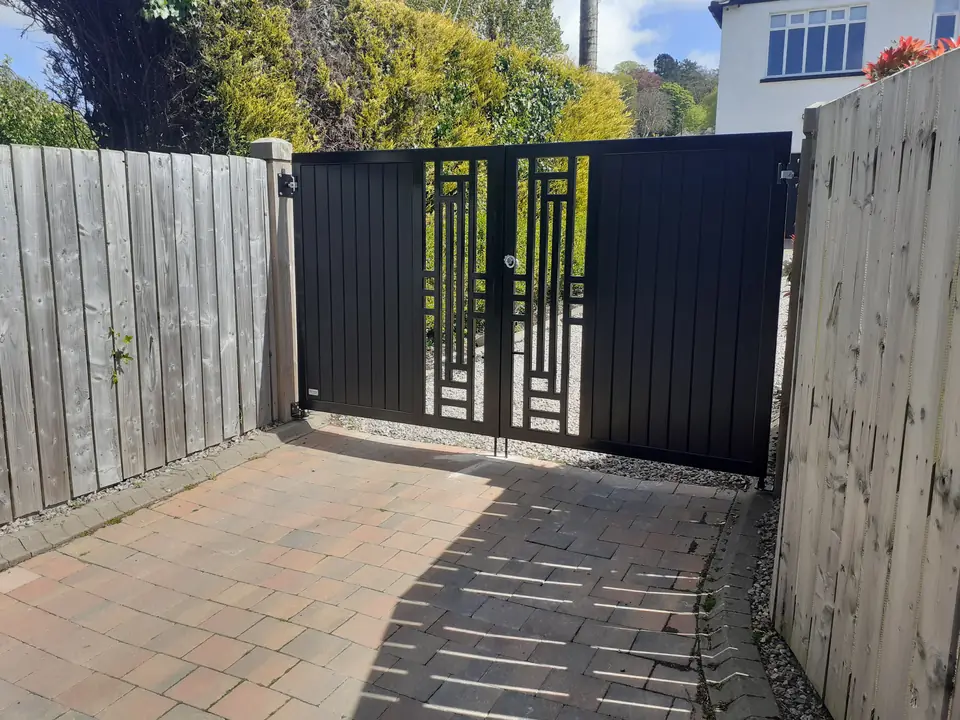 Metal frame driveway gates made by PJ Gates & Automation
