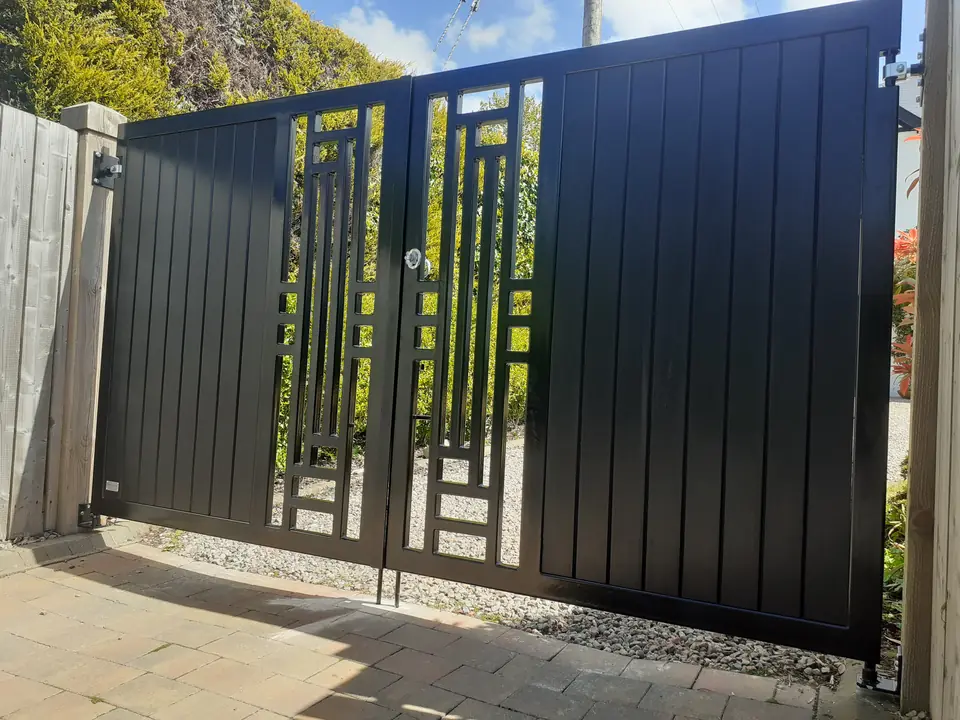 Metal frame driveway gates made by PJ Gates & Automation