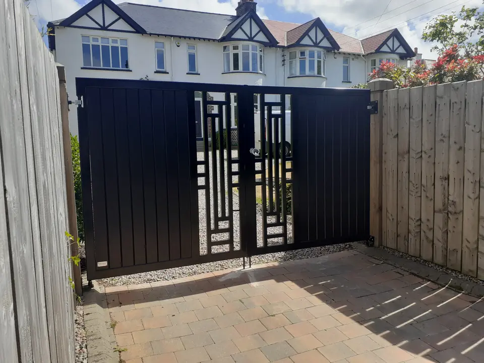 Metal frame driveway gates made by PJ Gates & Automation